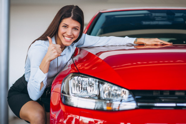 young-woman-buying-car_1303-13628