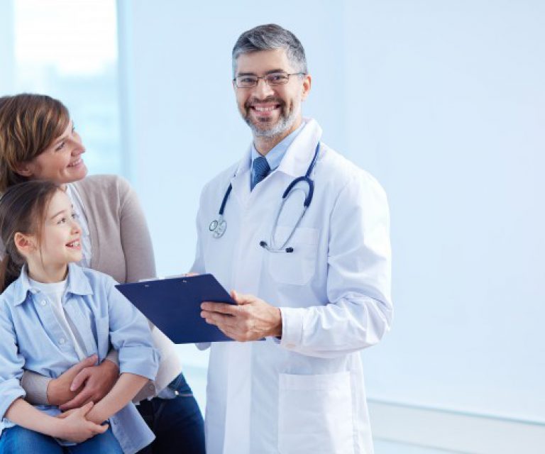 happy-doctor-holding-clipboard-with-patients_1098-2176