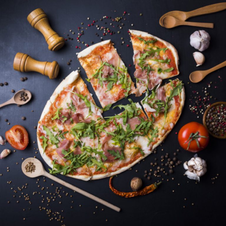 slices-italian-pizza-with-utensils-ingredients-black-kitchen-worktop_23-2148076119
