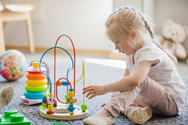 child-with-plaything-room_23-2147663691