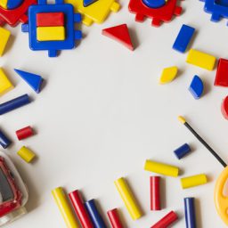 overhead-view-colorful-plastic-blocks-white-background_23-2147873802