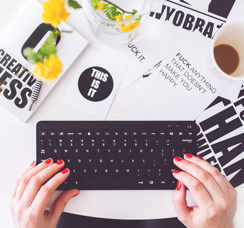 girl-writing-on-a-black-keyboard-6469