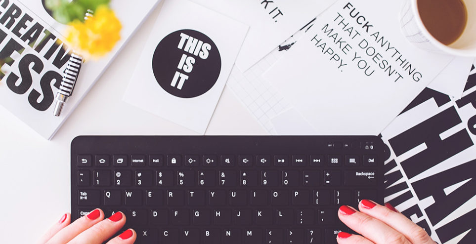 girl-writing-on-a-black-keyboard-6469